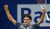 Federer strengthens bid for Tour finals with Pospisil win