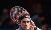 Federer advances in Paris; books 12th Tour Finals spot