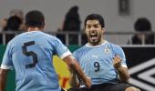 Qualifiers: Suarez brace boosts Uruguay's hopes; US suffer setback