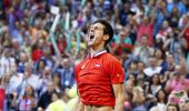 Djokovic hammers Raonic, Serbia level against Canada