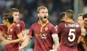 Roma climb atop Serie A