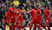 Football round-up: Liverpool, Atletico maintain title bids