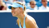 PHOTOS: Sharapova advances, Venus knocked out
