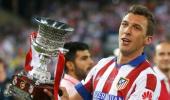 Atletico strike early to beat Real and win Spanish Super Cup