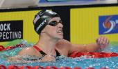 Sports Shorts: Ledecky breaks world record to overshadow Phelps