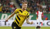 Bundesliga: Reus sparkles as Dortmund beat Augsburg 3-2