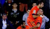 Valencia vow to banish fan who threw bottle at Messi