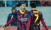 Messi lifts Barcelona back to the top of La Liga