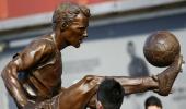 Arsenal honour Dennis Bergkamp with statue at Emirates stadium