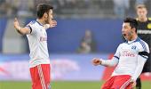 Calhanoglu's 40mt shot tops Bundesliga on day of drama