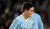 Man City's Samir Nasri out for eight weeks with knee injury