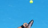 Aus Open PHOTOS: Li dumps Swiss to reach third round