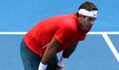 Del Potro beaten, Nadal thrives in scorching Melbourne