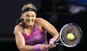 Azarenka chomps down Meusburger to reach fourth round