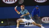 Vintage Federer routs Tsonga to book Murray quarter-final