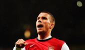 FA Cup: Podolski double helps Arsenal rout Coventry City