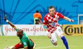 Croatia trounce 10-man Cameroon, set up Mexico showdown