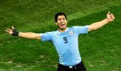 PHOTOS: Lethal Suarez keeps Uruguay's World Cup hopes alive