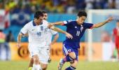 Ten-man Greece hold Japan goalless