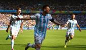 PHOTOS: Messi magic sends Argentina through to last 16