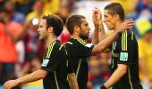 PHOTOS: Deposed champions Spain make short work of Australia