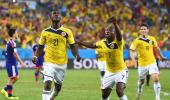 PHOTOS: Colombia top Group C; Greece scrape through