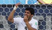 Suarez's bite gets him four months ban from football