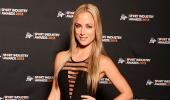 Pistorius goes on trial; girlfriend Reeva's mother wants him to see pain he caused her