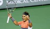 Indian Wells: Li, Federer win; Nadal survives scare