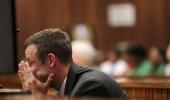 Pistorius vomits in court at Steenkamp autopsy details