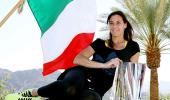 Pennetta overpowers injured Radwanska to clinch Indian Wells title
