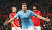 EPL PHOTOS: Manchester City embarrass United; Arsenal held