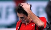 Federer's number one hopes take a hit in Paris defeat