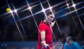 ATP Tour Finals PHOTOS: Federer made to grind it out by Raonic