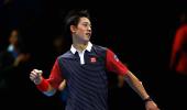 Nishikori beats stand-in Ferrer, now must wait