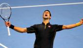 Djokovic trounces Berdych at Tour Finals, seals No.1 spot