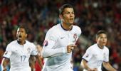 Euro qualifiers: Ronaldo helps Portugal overcome Armenia