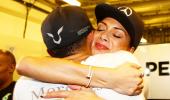 Proud Nicole kisses Hamilton to celebrate his world title win