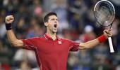 Federer sets up Djokovic showdown in Shanghai semis