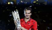 Federer downs injured Simon to win Shanghai Masters