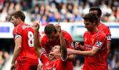 Four goals in last seven minutes as Liverpool beat QPR