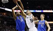 NBA: Spurs edge Mavs in San Antonio to open title defense