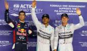 Hamilton edges Rosberg to secure Singapore pole