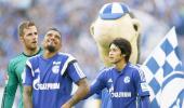 Bundesliga: Schalke shock Dortmund in derby, Bayern win