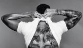 Decoding F1 star Lewis Hamilton's tattoos