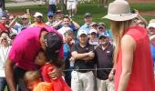 PHOTOS: Tiger Woods with his two adorable caddies