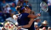 Hingis back in Fed Cup after half a lifetime away