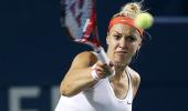 After a lengthy rain delay, Lisicki routs Venus