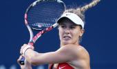 PHOTOS: Eugenie Bouchard 'almost' suspended in the air