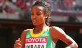 World Athletics Updates! Dibaba and Kiprop coast, holder Reese out of long jump